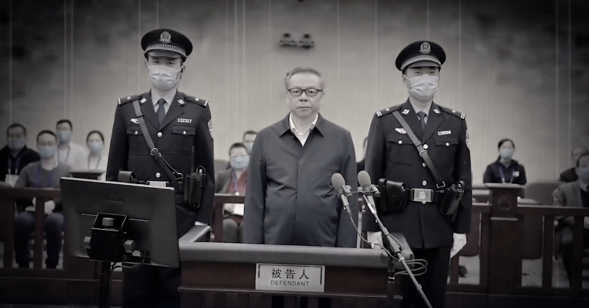 Ông Bạch Thiên Huy (Bai Tianhui) tại một phiên tòa xét xử tại Trung Quốc. (Ảnh: Từ video của NTD)
