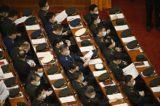 Đại biểu quân đội tham dự phiên họp toàn thể thứ hai của Đại hội Đại biểu Nhân dân ĐCSTQ vào ngày 07/03/2023. (Ảnh: Greg Baker/AFP)