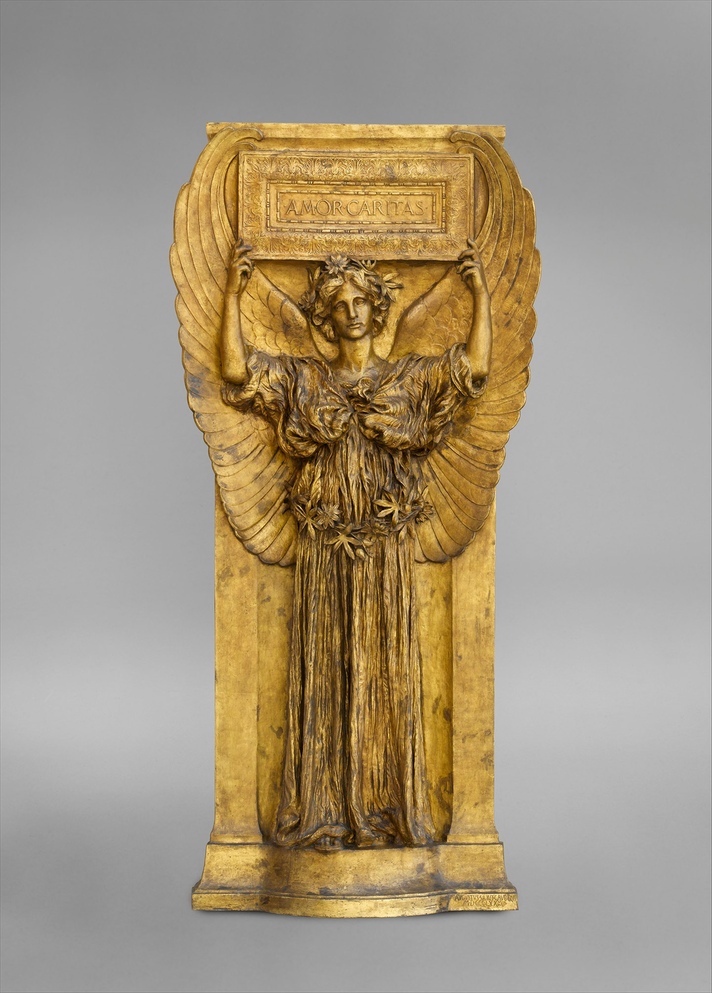 Bức tượng “Amor Caritas” (Tình Yêu và Bác Ái), năm 1880-1898, đúc năm 1918, của điêu khắc gia Augustus Saint-Gaudens. Đồng mạ vàng. Bảo tàng Nghệ thuật Metropolitan, Thành phố New York. (Ảnh: Tư liệu công cộng)