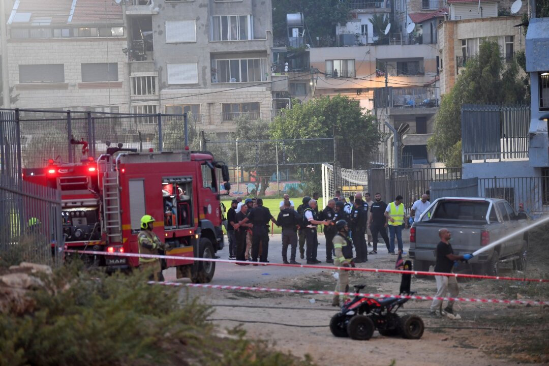 Israel cho biết cuộc tấn công hỏa tiễn của Hezbollah khiến 11 người thiệt mạng, làm dấy lên ám ảnh về chiến tranh với Lebanon